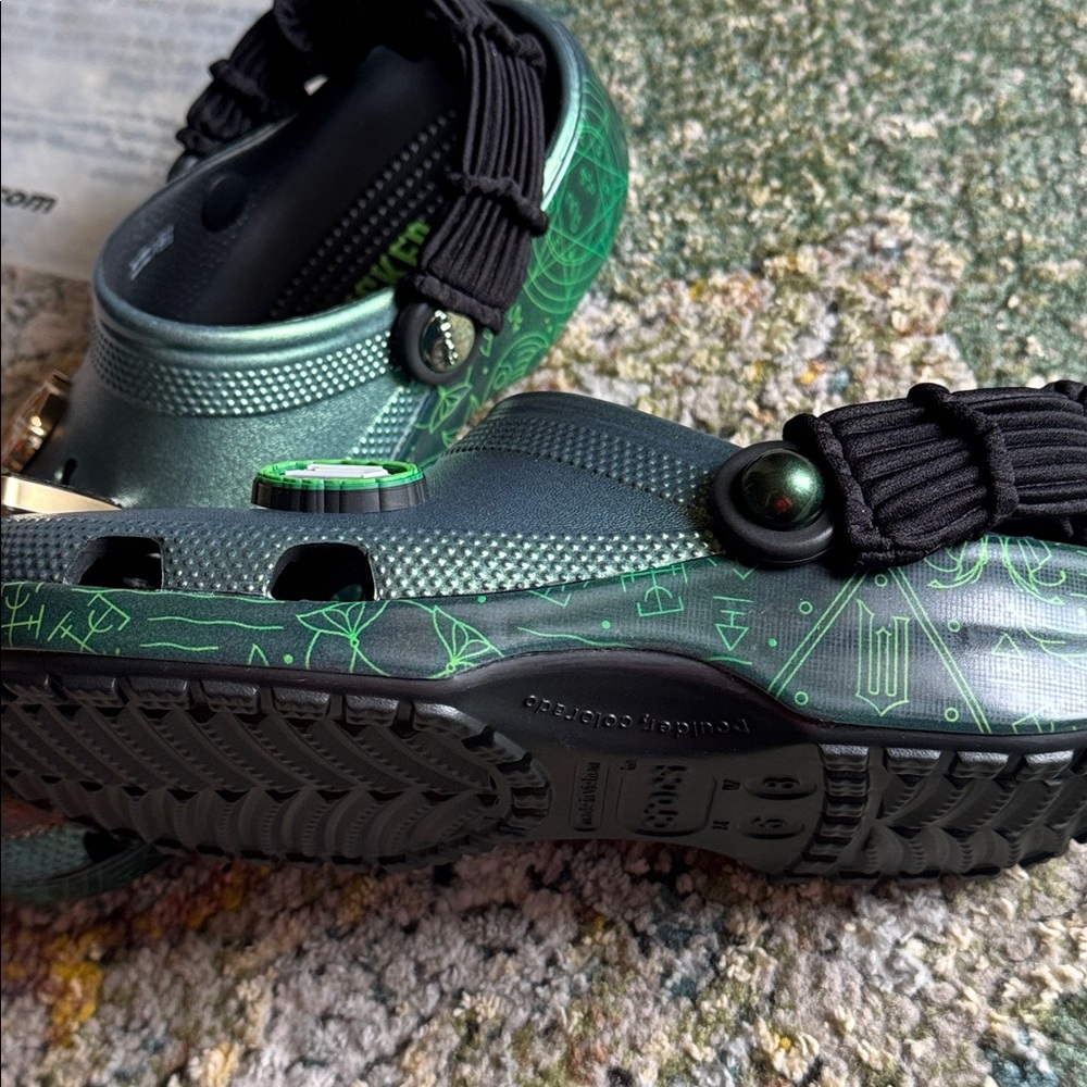 CROCS WICKED Classic Clogs with green metallic upper and themed Jibbitz charms. - Picture 7 of 8